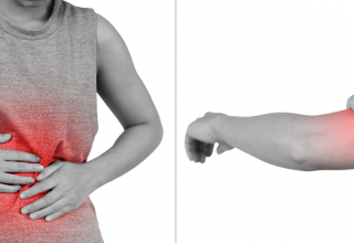 אישה עם סימן אדום בבטן ובזרוע כדי לסמל דלקת שיכולה לגרום לכאבים ולמחלות אחרות